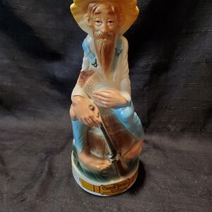 Vintage Figurine with Blue and Tan Accents
